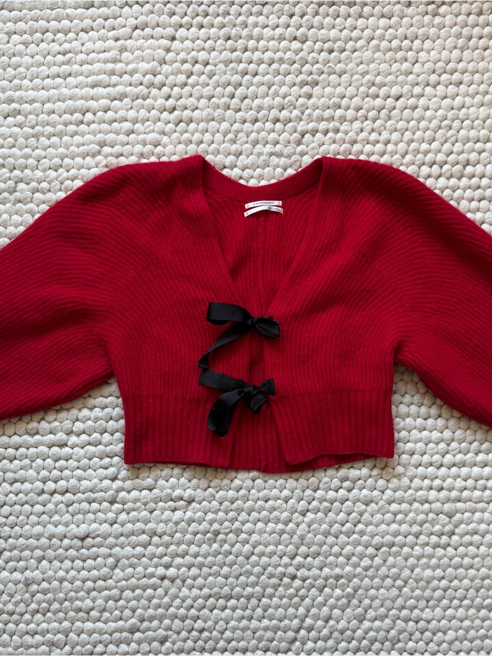 Anthropologie Red Cropped V‑Neck Sweater with Black Ribbon Ties